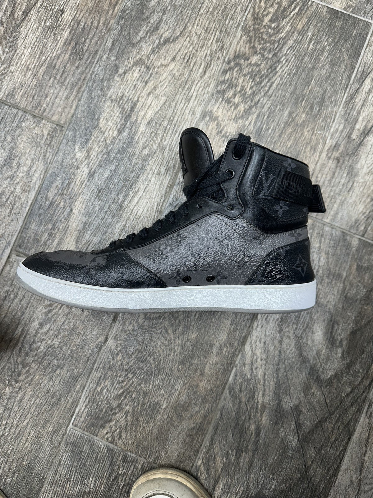LOUIS VUITTON - Men's Rivoli High Top Sneakers - Monogram - Size US 11