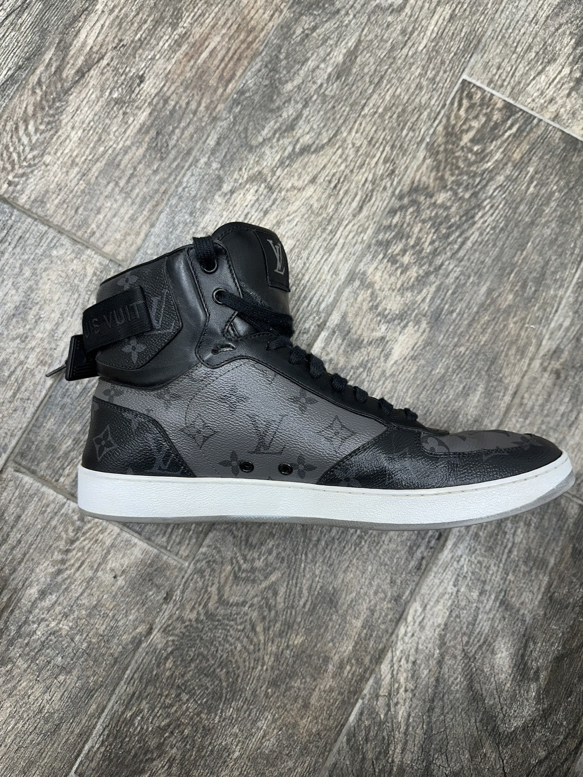 LOUIS VUITTON - Men's Rivoli High Top Sneakers - Monogram - Size US 11
