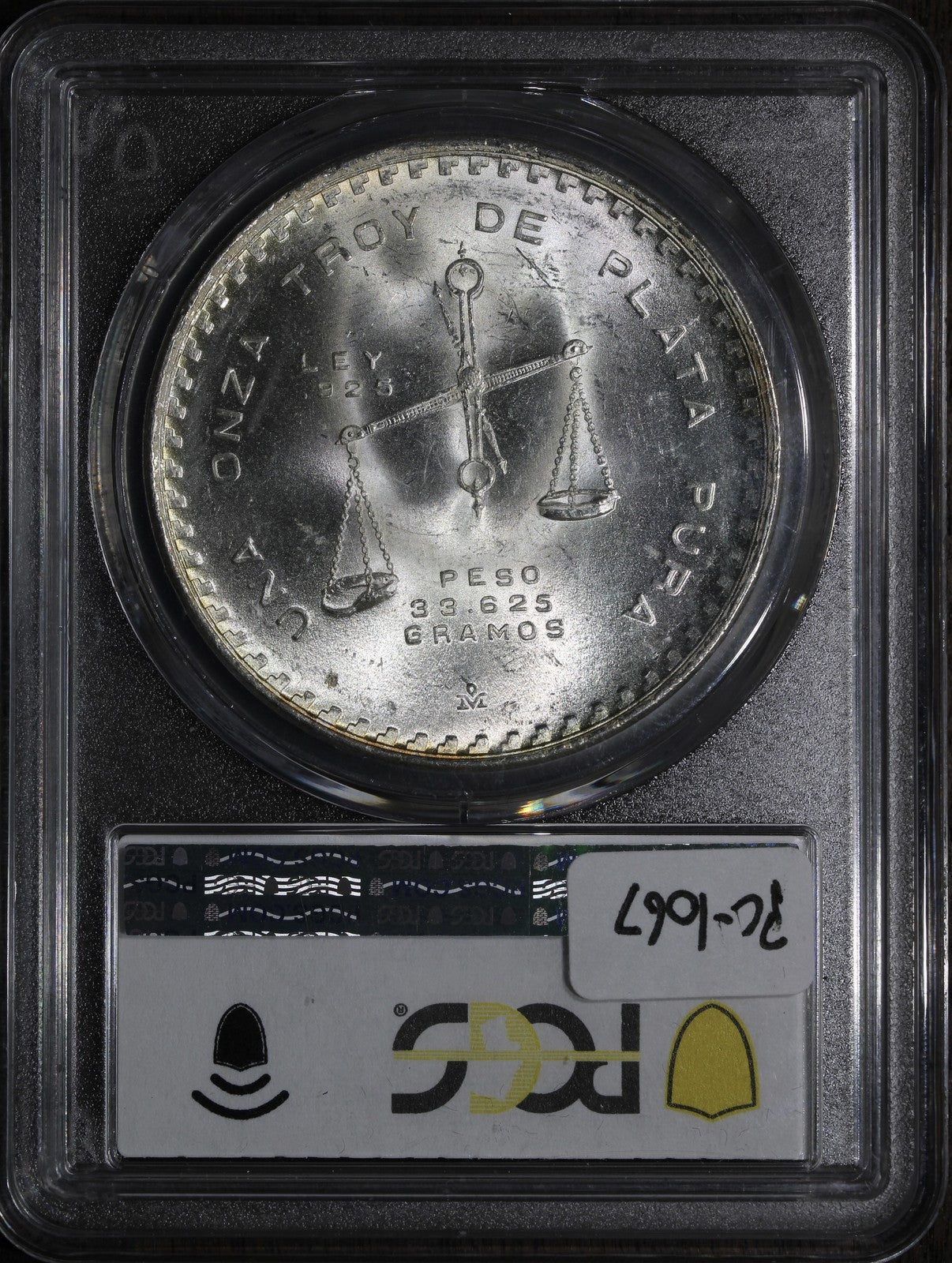 1979-Mo (MS66) Mexican Silver Onza PCGS - Rainbow Toned