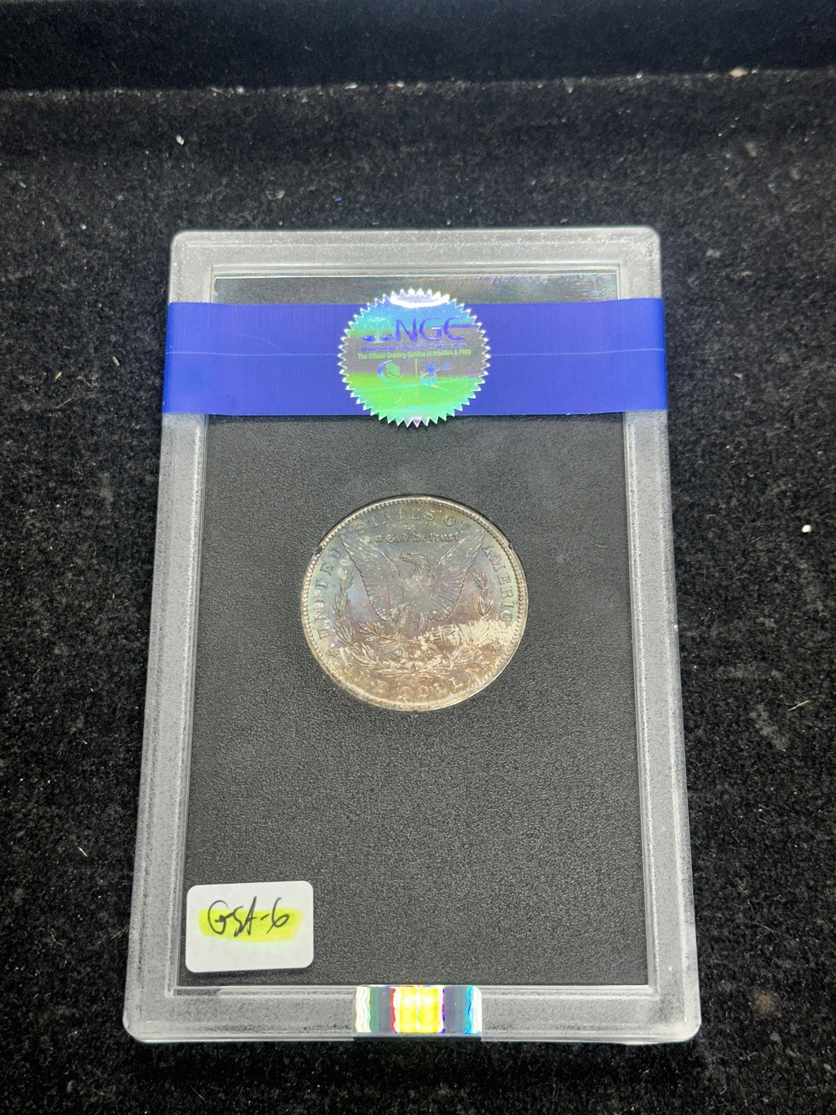 1884-CC (MS65) GSA Morgan Silver Dollar $1 NGC - RAINBOW REVERSE Chipped Holder