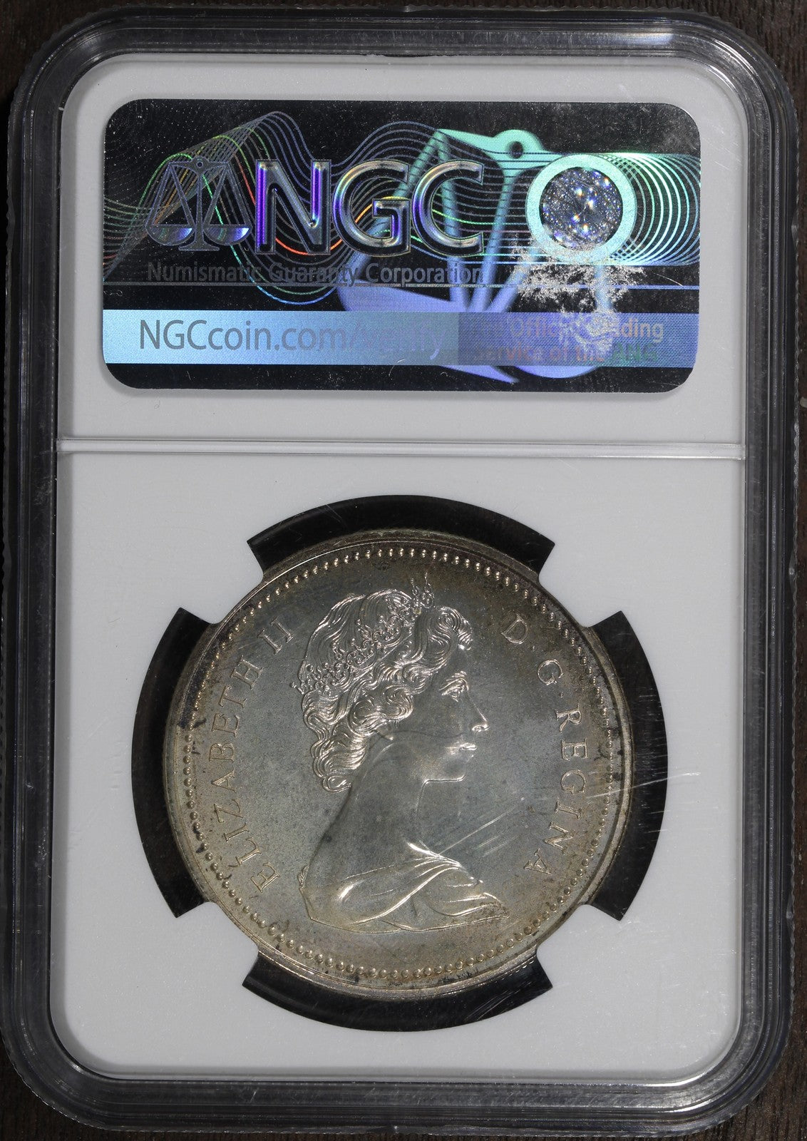 1973 (SP66) RCMP Centennial Canada Silver Dollar $1 NGC - Rainbow Toned