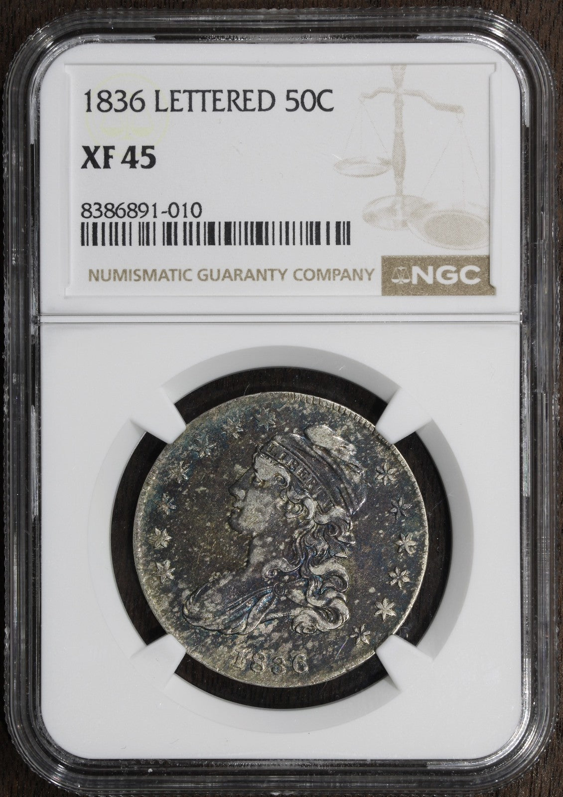 1836 (XF45) Capped Bust Half Dollar NGC - Lettered Edge, Colorful Toning