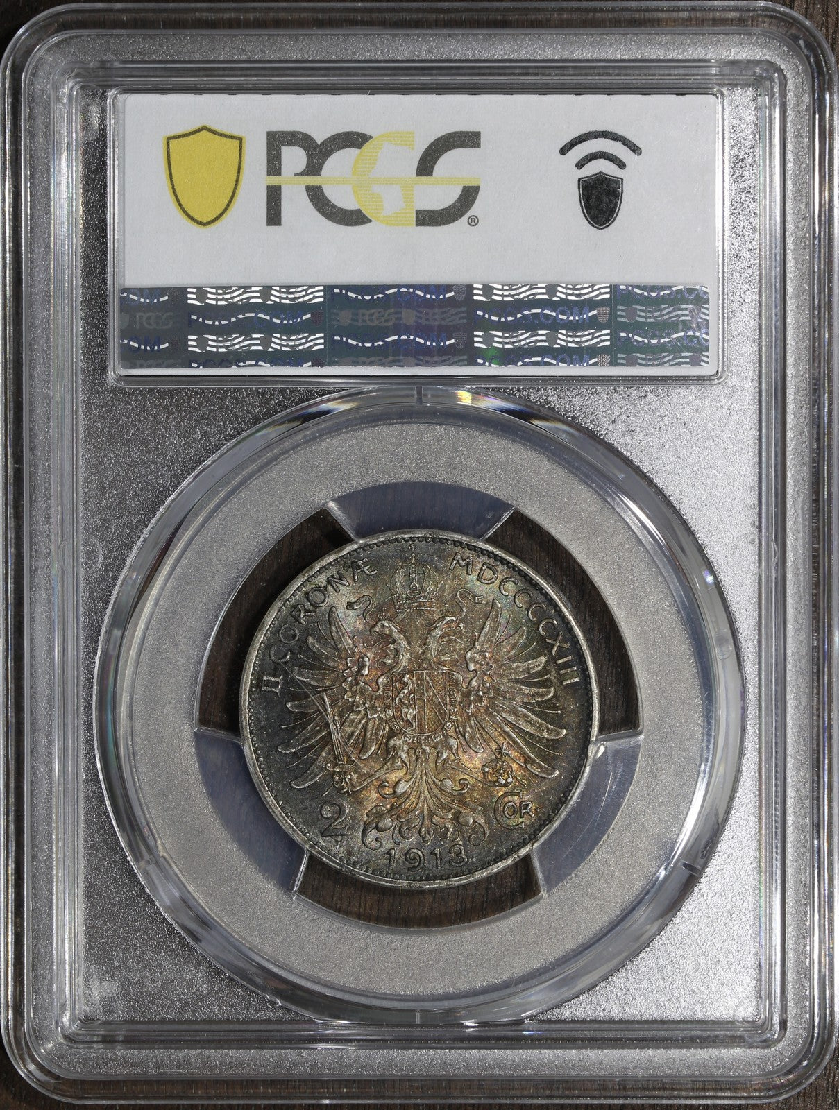 1913 (MS65+) Austria Franz Joseph Silver 2 Corona PCGS - Rainbow Top Pop