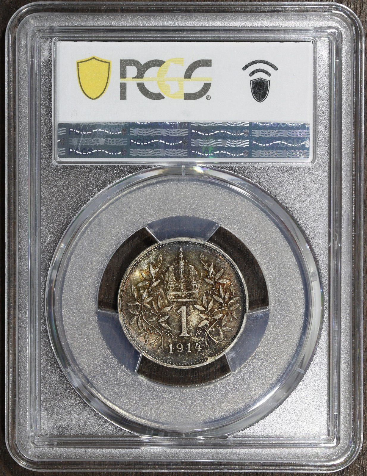 1914 (MS65) Austria Franz Joseph Silver 1 Corona PCGS - Rainbow Toned GEM