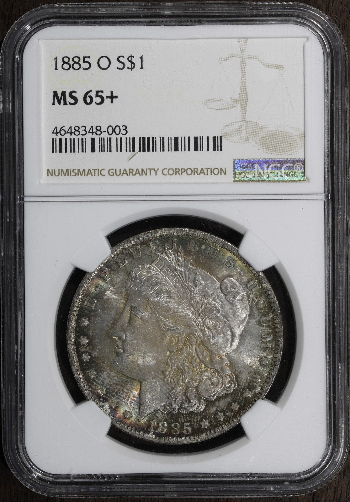 1885-O (MS65+) Morgan Silver Dollar $1 NGC - Plus Grade, Rainbow Toned