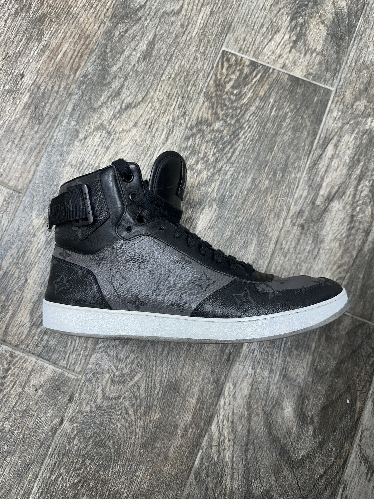 LOUIS VUITTON - Men's Rivoli High Top Sneakers - Monogram - Size US 11