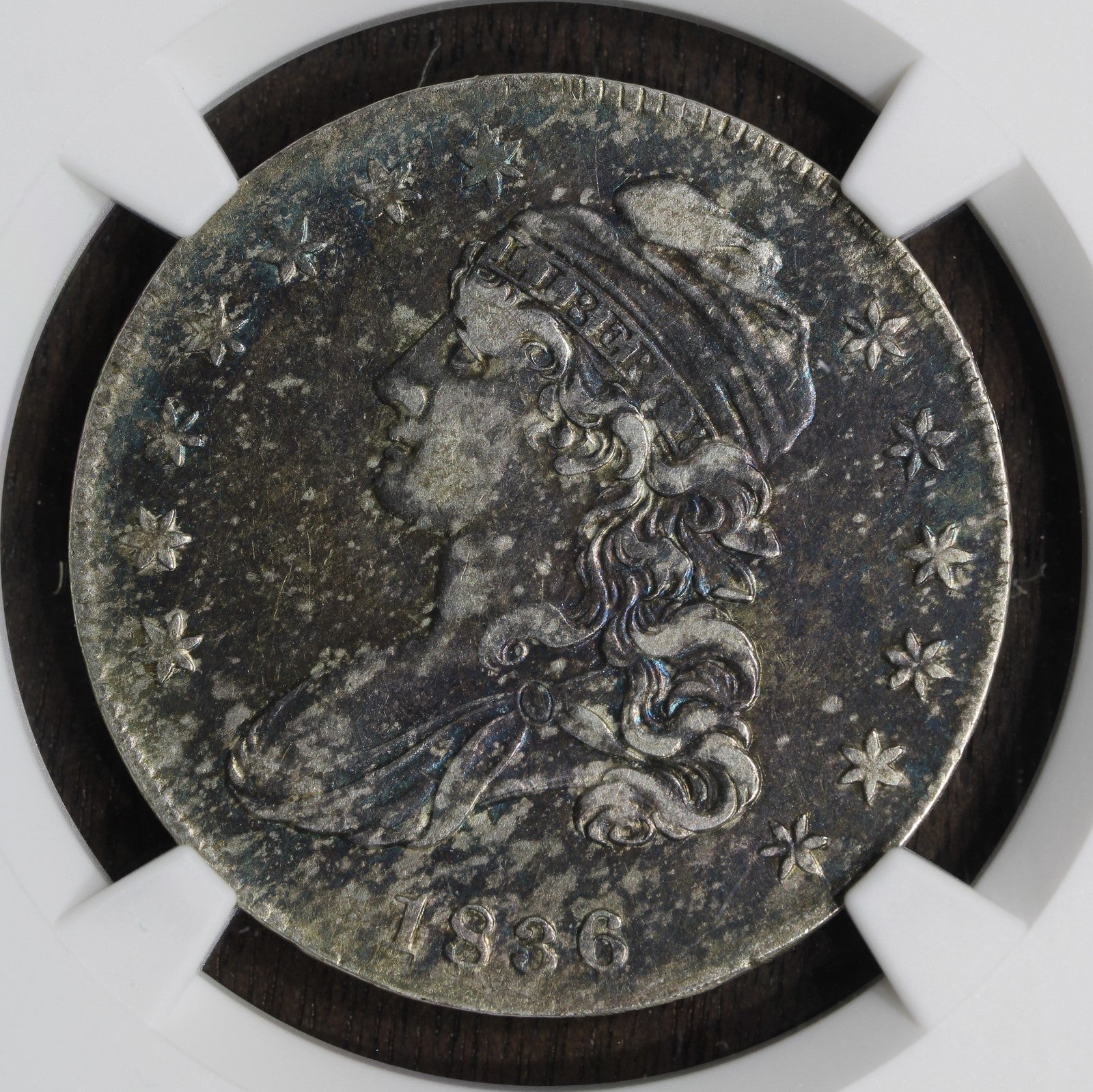 1836 (XF45) Capped Bust Half Dollar NGC - Lettered Edge, Colorful Toning