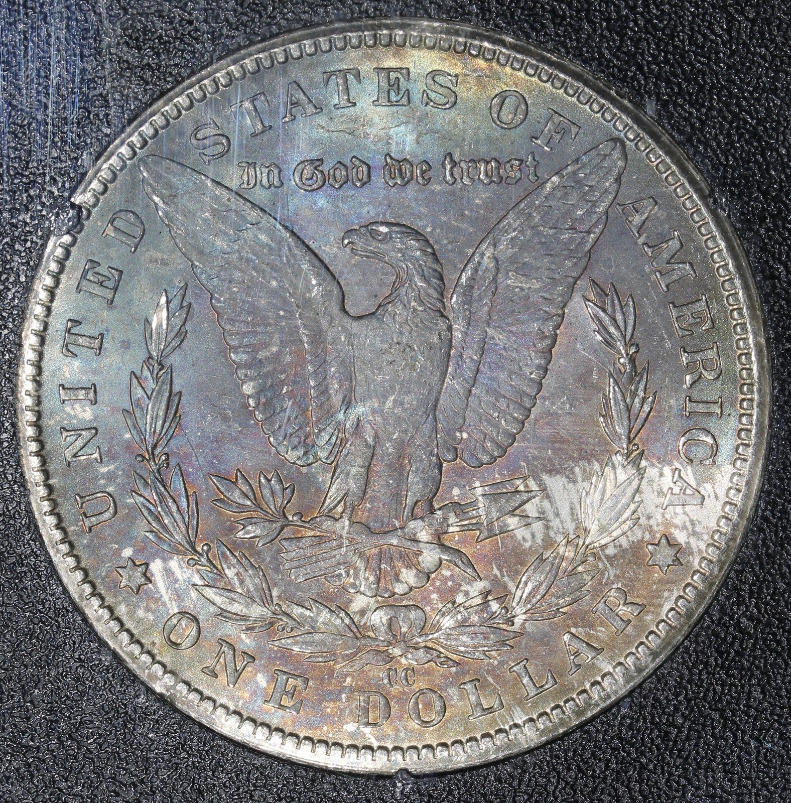 1884-CC (MS65) GSA Morgan Silver Dollar $1 NGC - RAINBOW REVERSE Chipped Holder
