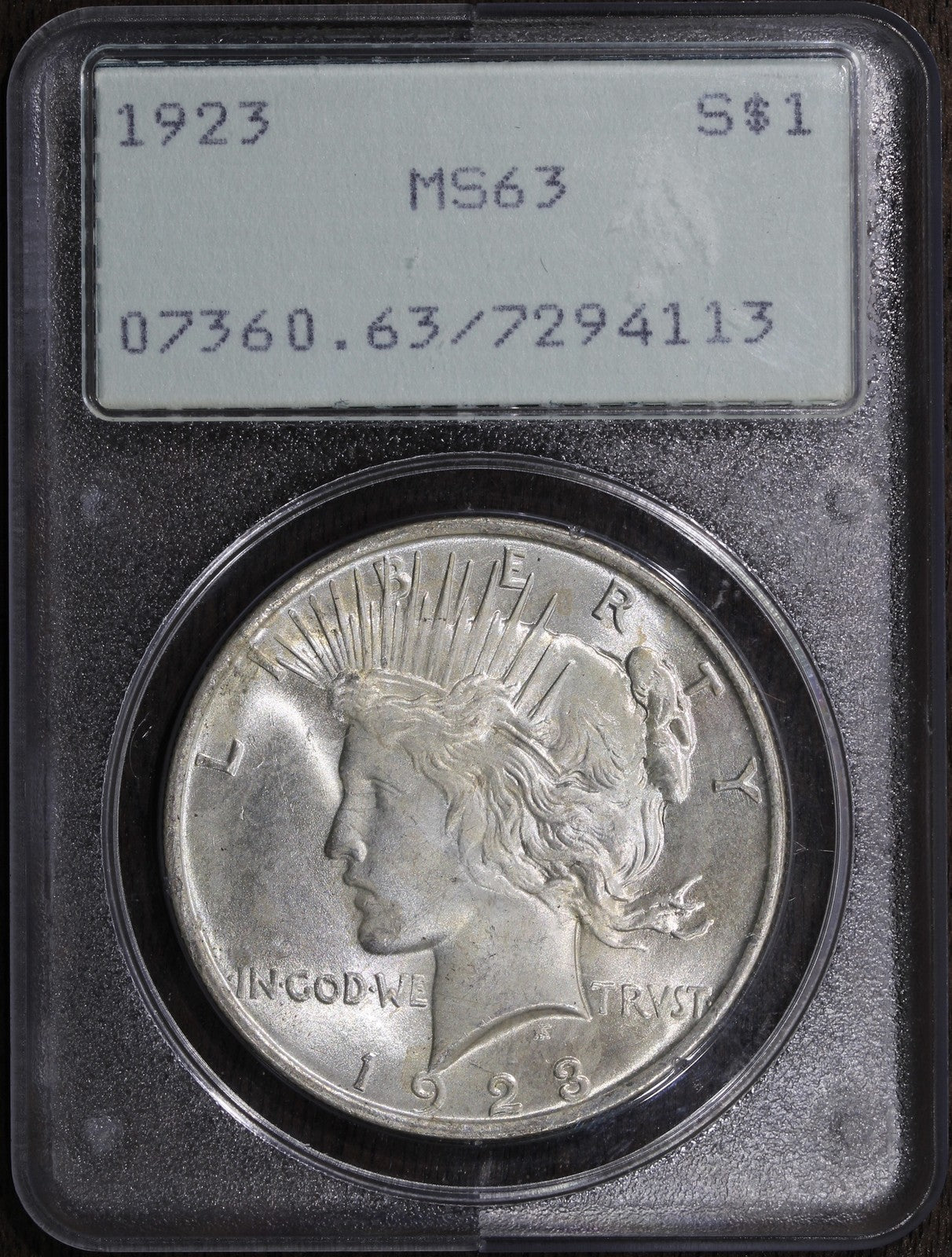 1923 (MS63) Peace Silver Dollar $1 PCGS OGH - RATTLER