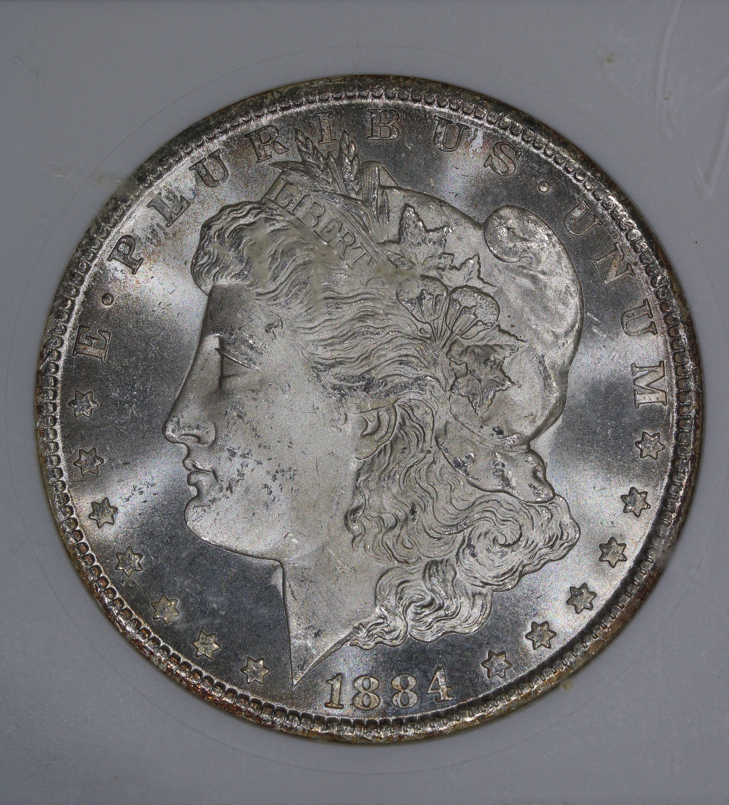 1884-CC (MS64) $1 Morgan Silver Dollar ANACS Soapbox Holder