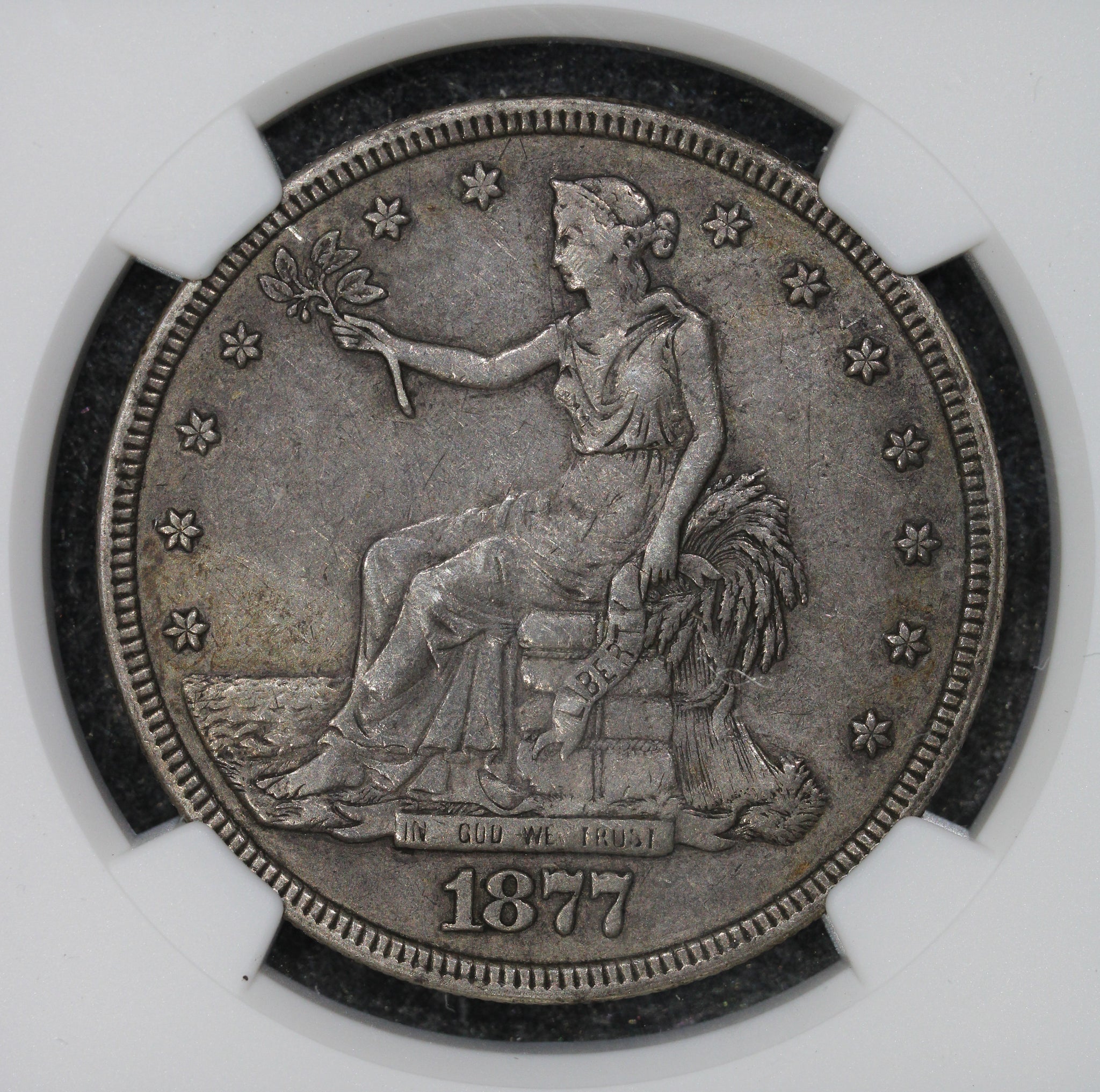 1877 (AU50) $1 Trade Silver Dollar NGC 1877-P Philadelphia