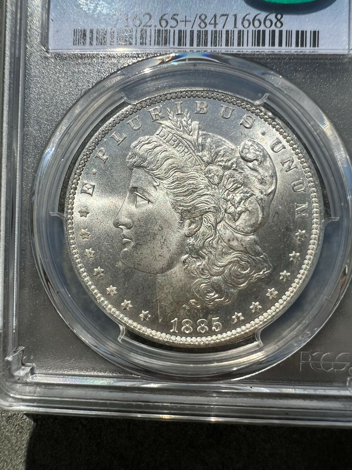 1885-O (MS65+ CAC) Morgan Silver Dollar PCGS Graded Coin